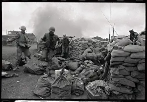 Soldiers Resting on Sandbags