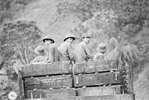 Soldiers Riding in Military Vehicle