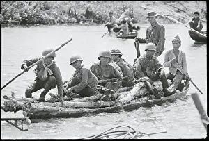 Soldiers Riding on Sampan of Logs
