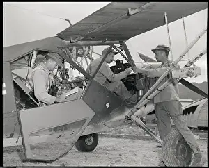 Cockpit Prints: Soldiers Seated In Airplane Cockpit