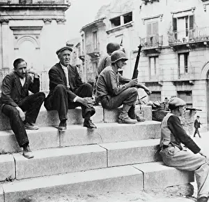 Huty32801 Prints: US Soldiers Seated On Church Steps
