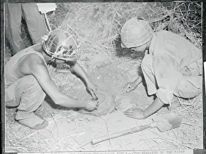 Soldiers Setting a Tank Mine