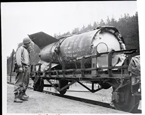 Private Prints: Soldiers Survey Captured Rocket