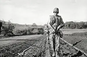 Sweeping Prints: Soldiers Sweeping Road For Mines