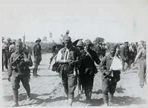 Endurance Prints: Soldiers Trekking on Road During World War I