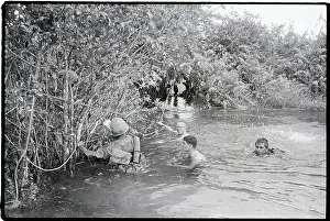 Wading Prints: Soldiers Wade Across Swollen Stream