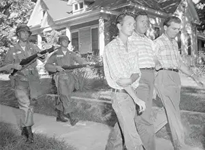 Intimidation Prints: Soldiers Walking Men Down Street with Bayonets