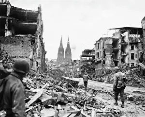 Soldiers Walking Through War Torn German City