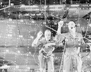 Military Airbase Prints: Soldiers Write Aircraft Movements on Plotting Board