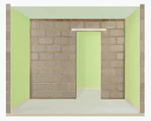 A solid block wall with doorway