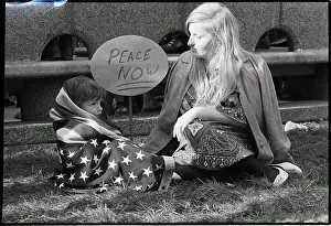 Sit In Prints: Son in US Flag Sits with Mother on Ground