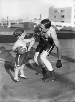 Punching Prints: Son Giving Boxer Father KO Punch
