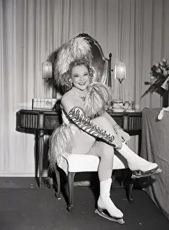 Dressing Room Prints: Sonia Henie Puts On Ice Skates