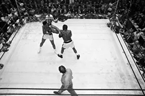 Twisting Prints: Sonny Liston and Cassius Clay Crossing Arms