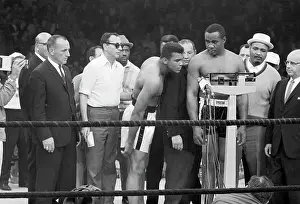 Watching Prints: Sonny Liston and Muhammad Ali Weigh-in Before a Match