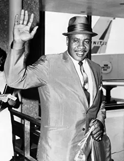 Sonny Liston Waving at Airport