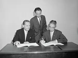 Sony Executive Signing Stock Documents