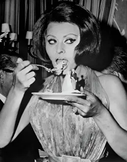 Sophia Loren Eating Cake in Movie Still