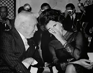 Sophia Loren Whispering to Charlie Chaplin