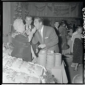 Sophie Tucker Feeding Cake to Vic Mature