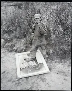 Marshal Prints: South Korean Soldier Stepping on Picture of Stalin