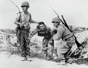 South Korean Prints: South Korean Soldiers Dragging North Korean Soldier from Hiding