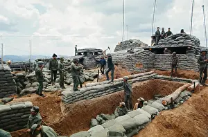 Laos Prints: South Vietnamese Soldiers Building Bunkers atop Hill