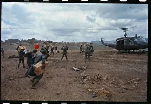 Laos Prints: South Vietnamese Soldiers Loading Helicopter with Supplies