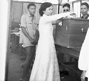 Saigon Prints: South Vietnamese Woman Casting Ballot