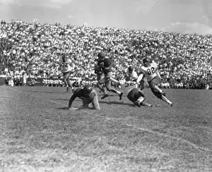 Running Back Prints: Southern Methodist University Versus Texas Tech in 1948