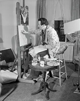 Spanish Surrealist Salvador Dali Painting at Easel