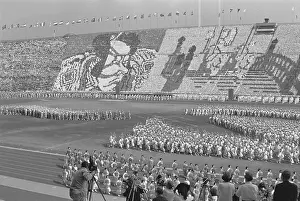 Spectators Forming Giant Pictures in Stadium Stands