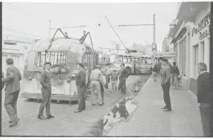 Spectators Observing Riot Damage