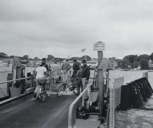 Spectators Standing on Ferry Dock