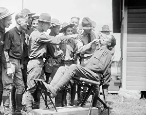Spectators Watching Man Extract Tooth from Colleague