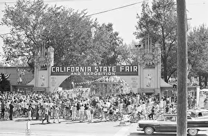 Fairground Prints: Spectators Watching Rocket Man