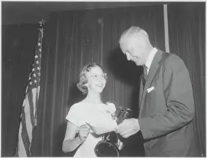 Spelling Bee Winner Receiving Her Award