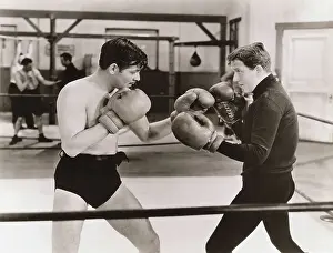 Timeless charm - Legendary style.: Spencer Tracy and Clark Gable Boxing in San Francisco