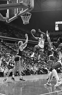 Basketball Prints: Spud Webb Jumping Above Larry Bird