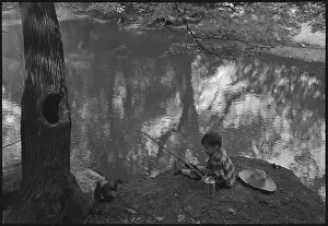 Squirrel Watching Boy Fish