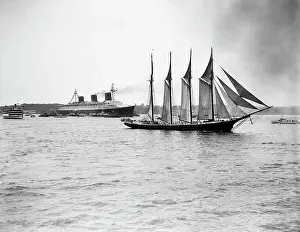 S.S. Normandie Passing Sailboat