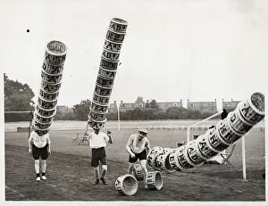 Porter Prints: Stacks Of Baskets Fall Off Porters Heads