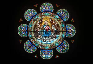 Images Dated 13th June 2018: Stained Glass Rose Window featuring the Virgin Mary and her son Jesus Christ in the