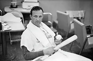 Stan Musial Prints: Stan Musial Seated Holding Bat And Ball