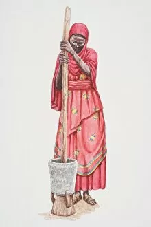 Standing African woman in traditional Somalian clothing pounding grain in a clay pot using a stick, front view