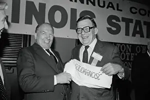 Stanislaw Walesa Giving T-Shirt to Lane Kirkland
