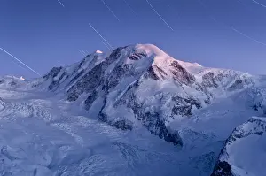 Zermatt Prints: star trail over snow mountain