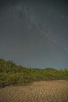 Images Dated 26th October 2017: Starry sky over cracked desert, Isla San Jose, Baja California Sur, Mexico