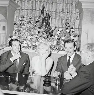 Stars of Let's Make Love at Cocktail Party