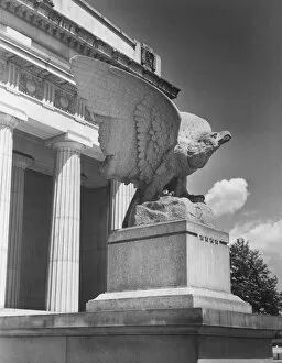 Statue of eagle outside building
